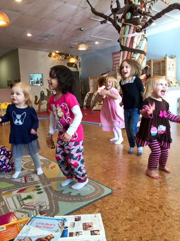 A group of kids jumping at one of Kids Garden's classes as part of our new stay n' play package.