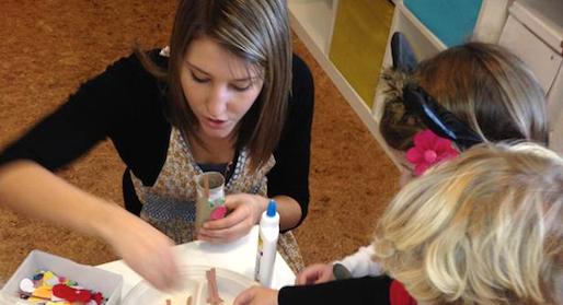 Our preschool director Michelle Klaus with a class of children.