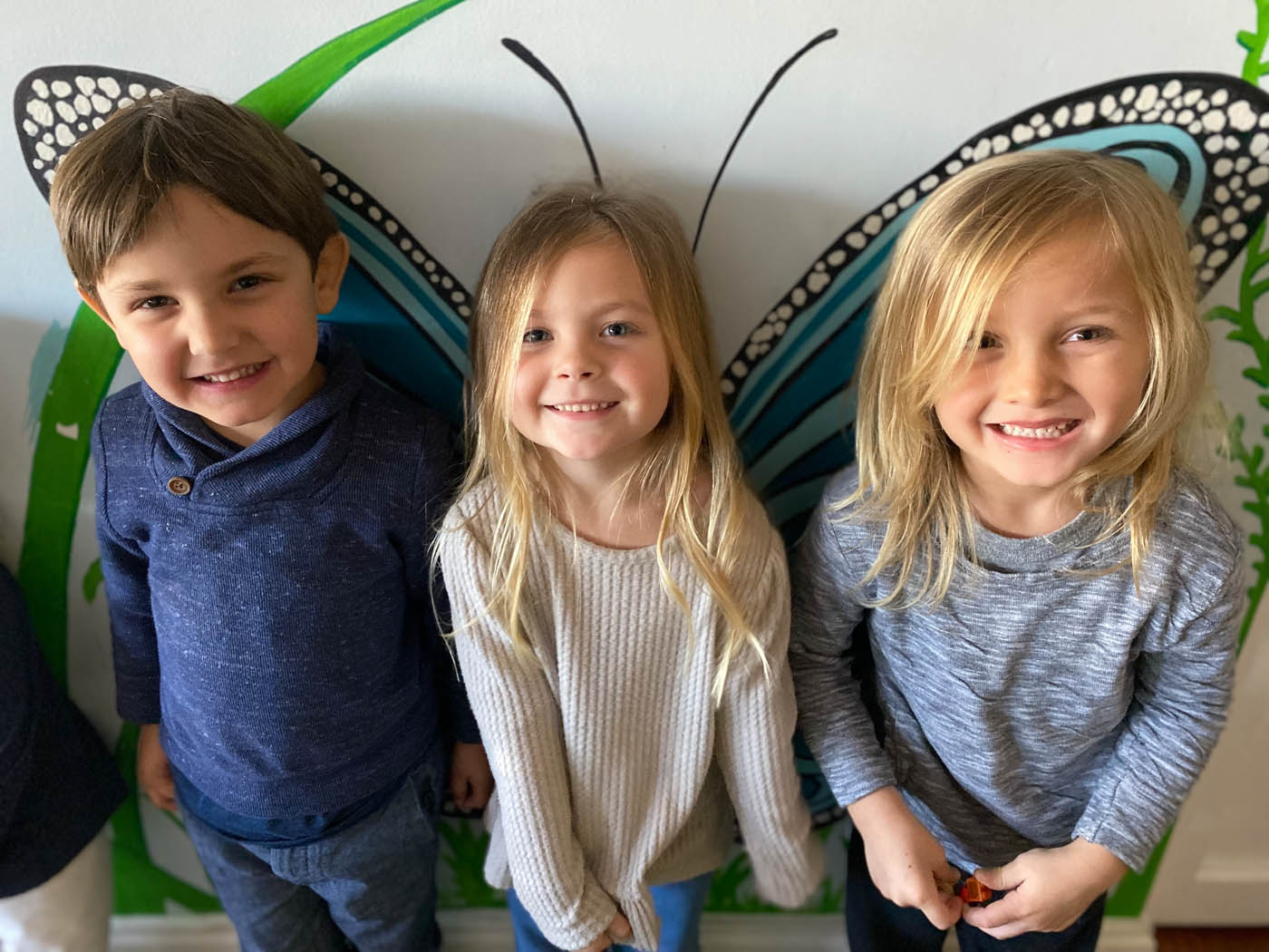 Three children enjoying part time daycare at Kids Garden.