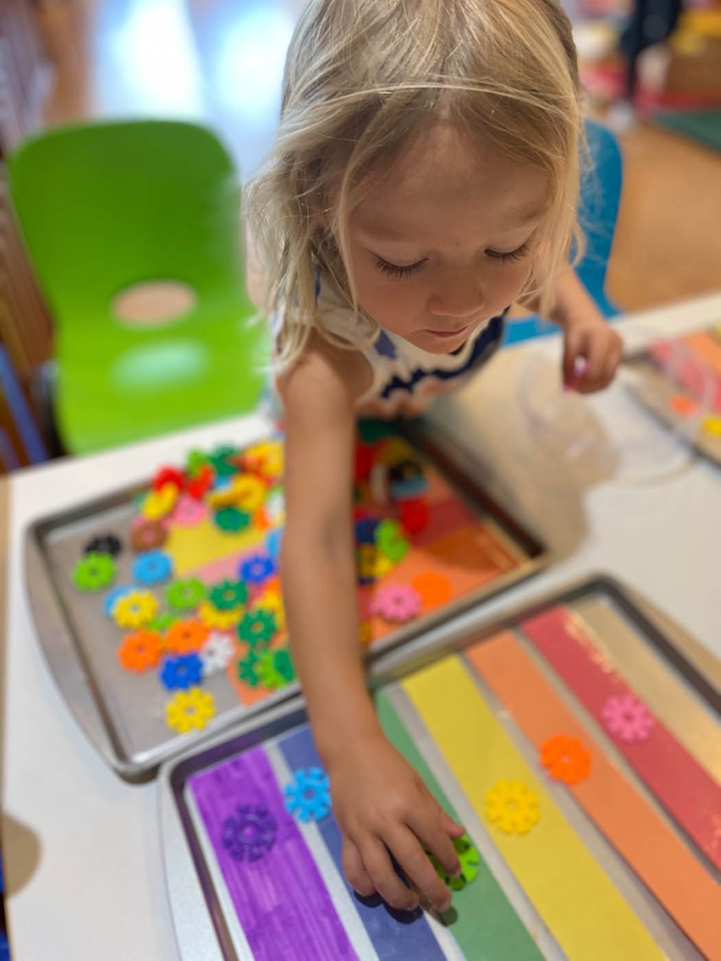 A little girl playing with colors and shapes at Kids Garden Mt. Pleasant, SC.