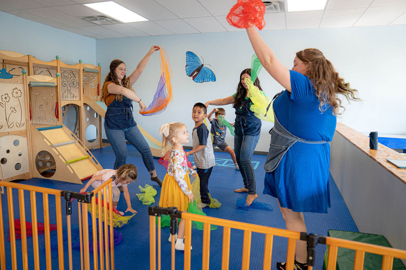 A group of Kids Garden employees dancing and playing at our summer program for preschoolers.