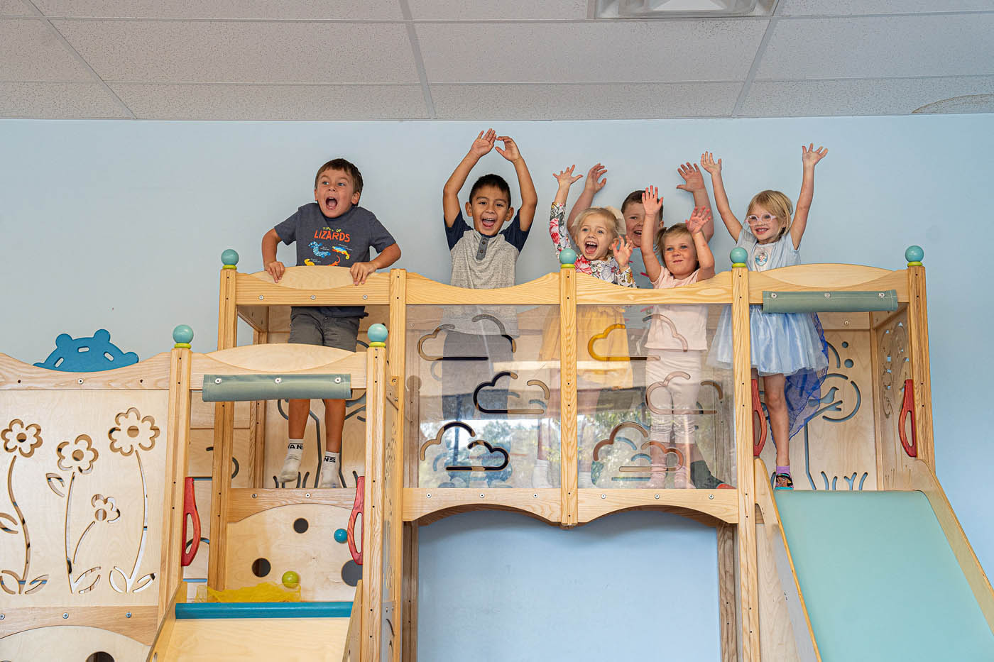 A group of kids playing at Kids Garden montessori school in Summerville, SC.