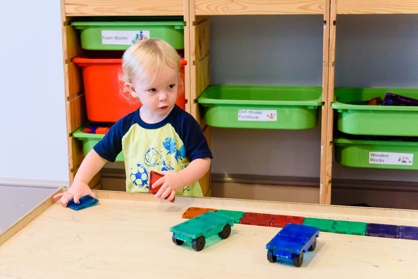 A young boy playing at Kids Garden summer childcare & daycare in Summerville, SC.